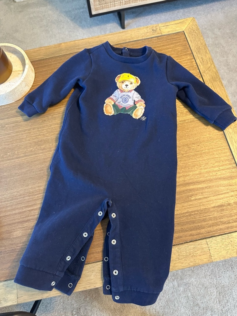 6-9 months. Worn once. Ralph Lauren Navy Romper